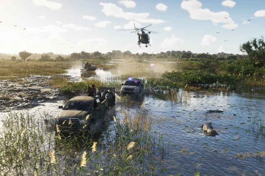 A chase through the wetlands: a mud-covered pickup loaded with riders and a police vehicle with flashing lights cross shallow water, a helicopter overhead, alligators among the reeds in the foreground.