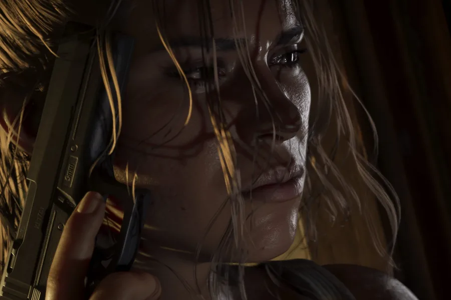 Lucia Caminos in profile in low light, holding a handgun close to her face, strands of hair falling across her eyes.